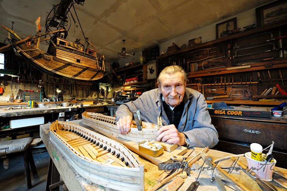 ship scale model maker Kurt Schaefer in his workshop