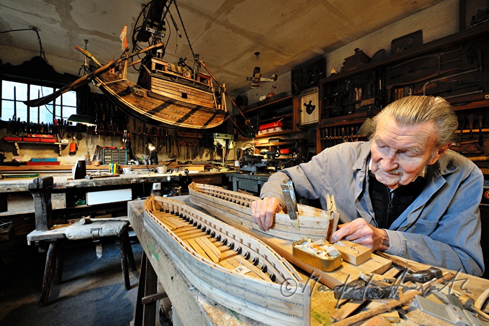 ship scale model maker Kurt Schaefer in his workshop