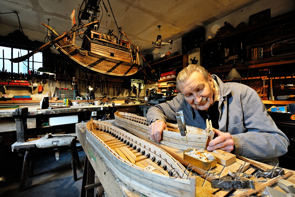 ship scale model maker Kurt Schaefer in his workshop