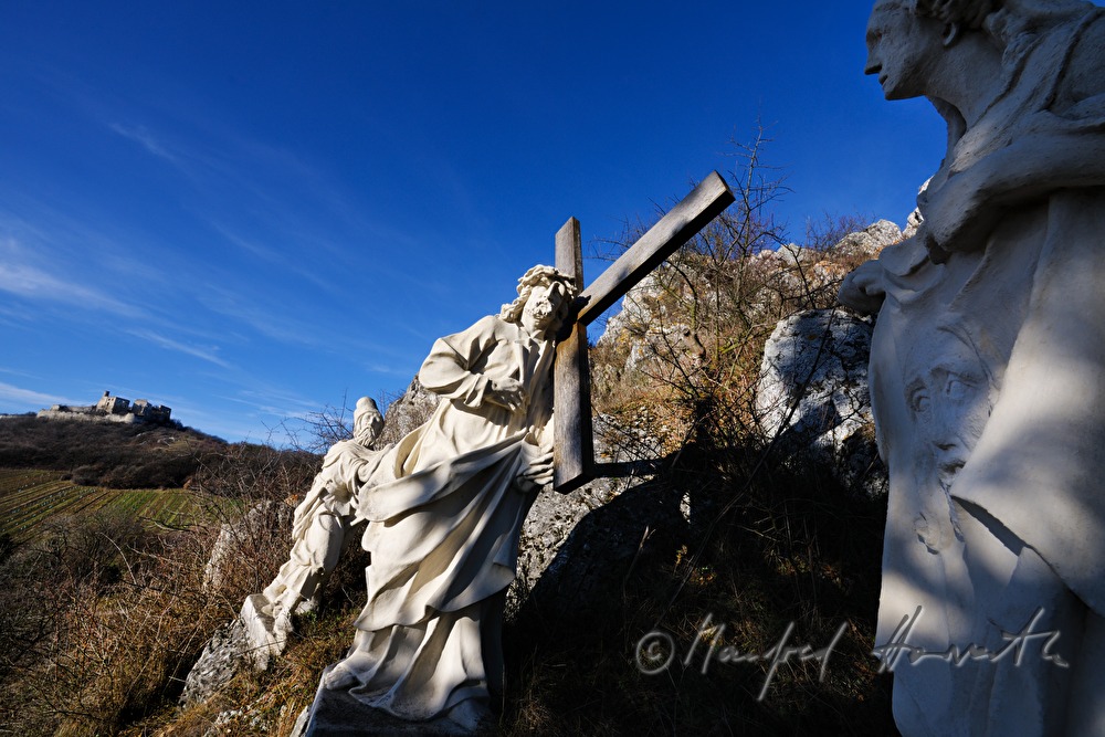 church with calvary and field