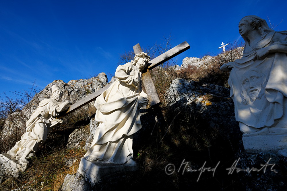 church with calvary and field
