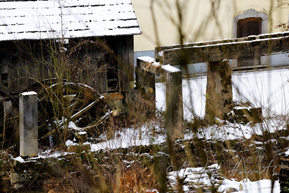 mill-race and water wheel of a water mill