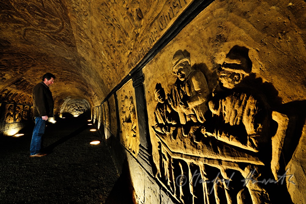 wine cellar with carvings in the clay wall and ceiling