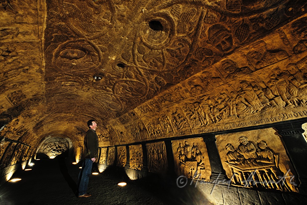 wine cellar with carvings in the clay wall and ceiling