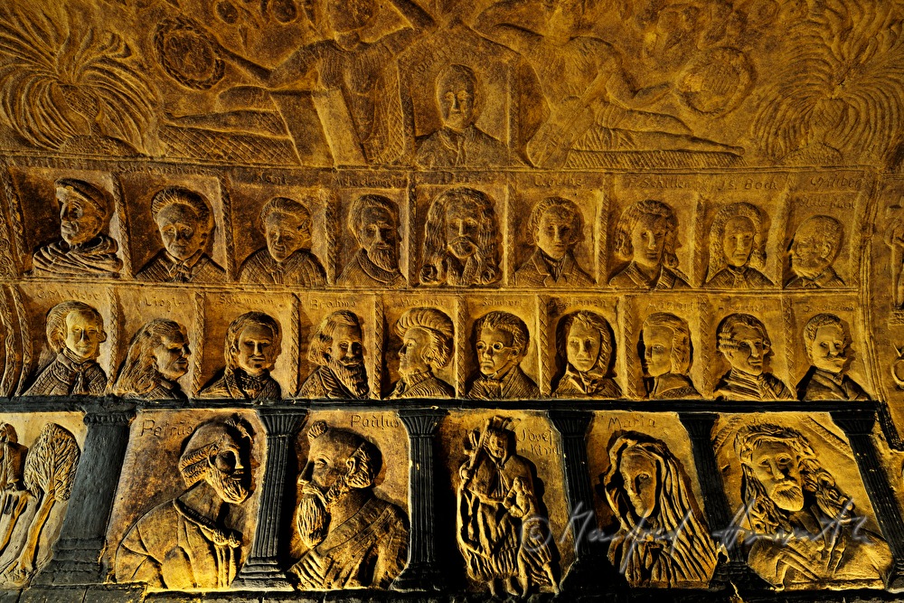 wine cellar with carvings in the clay wall and ceiling