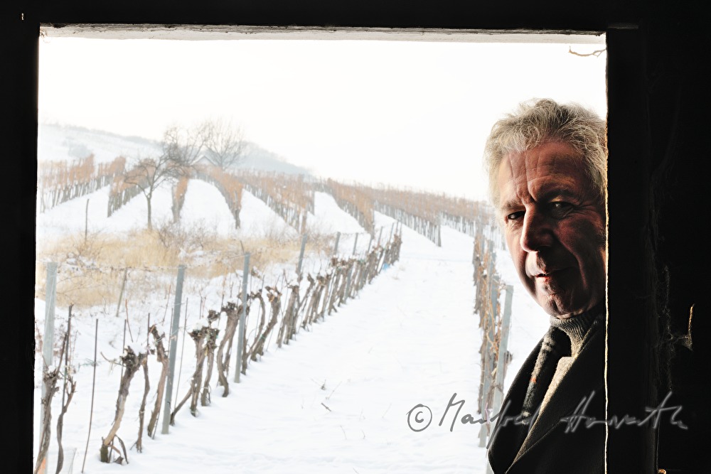 Alfred Komarek in front of his wine cellaro