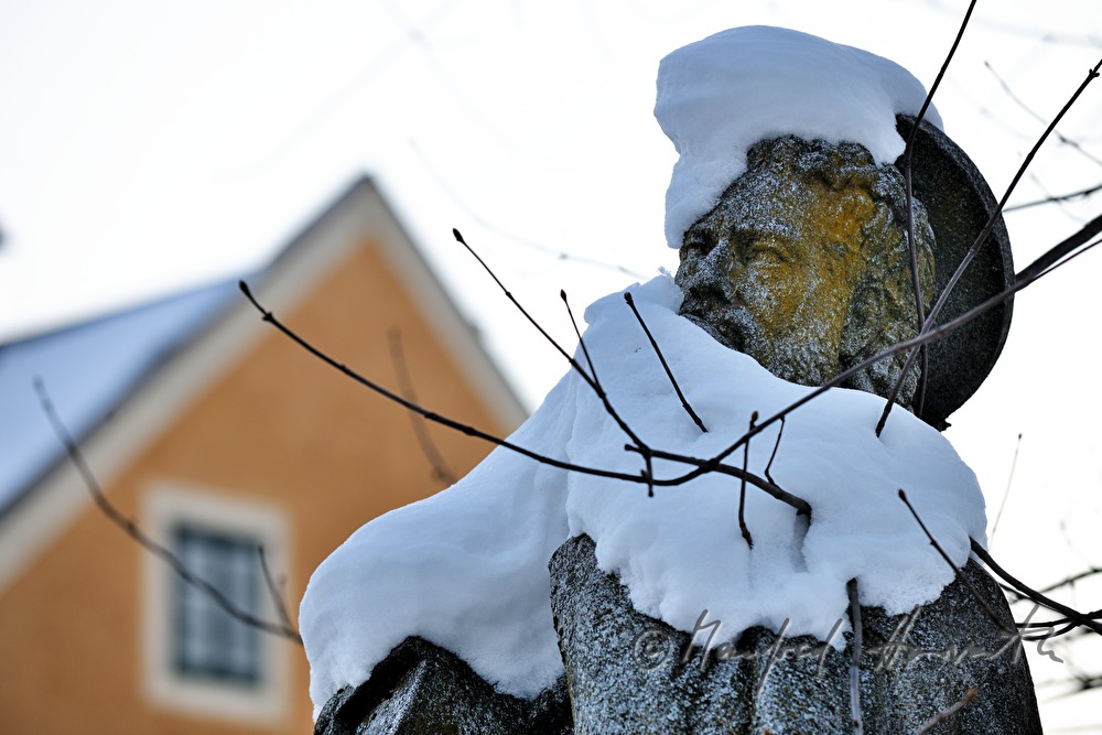 snowcovered statue of Holy Nepumuk