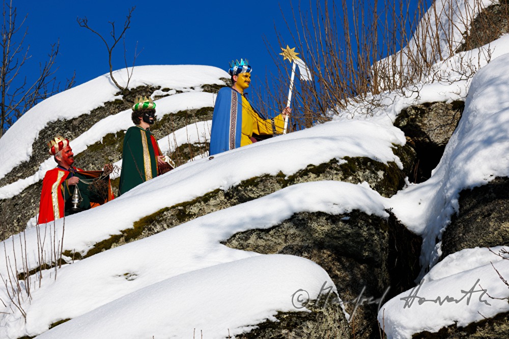 Three Wise Men crossing a forest glade