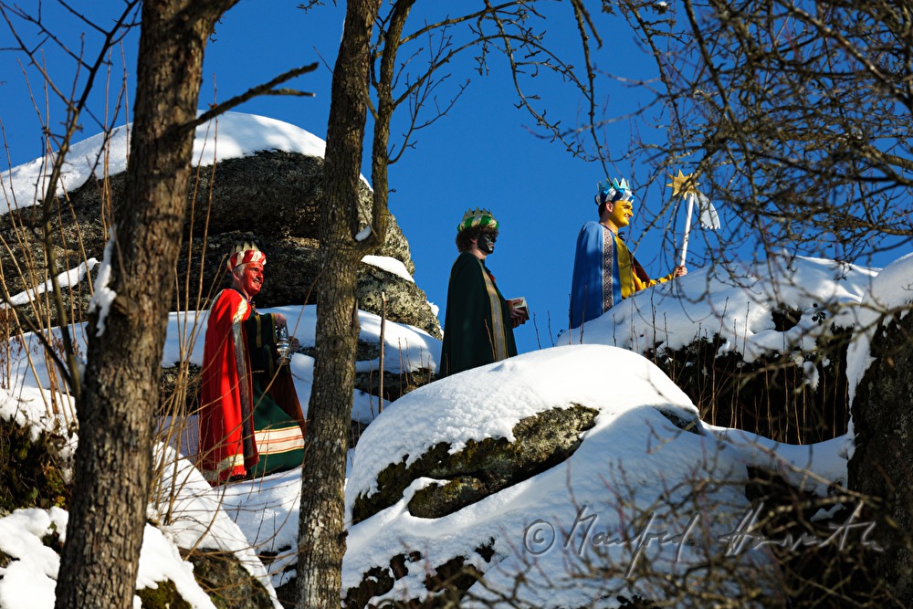 Three Wise Men crossing a forest glade