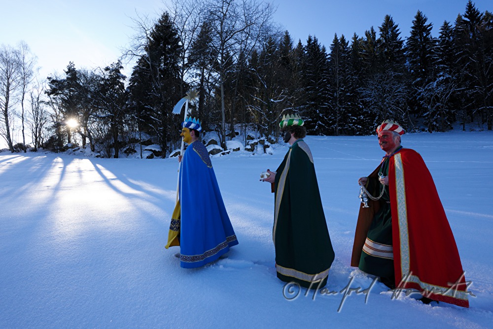 Three Wise Men crossing a forest glade