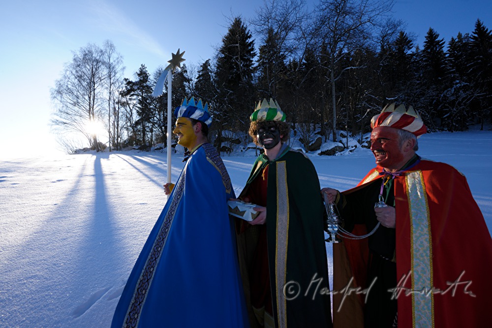 Three Wise Men crossing a forest glade