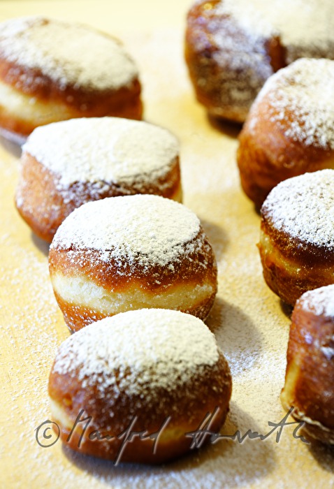 Krapfen (doughnut) made of deep-fried yeat dough