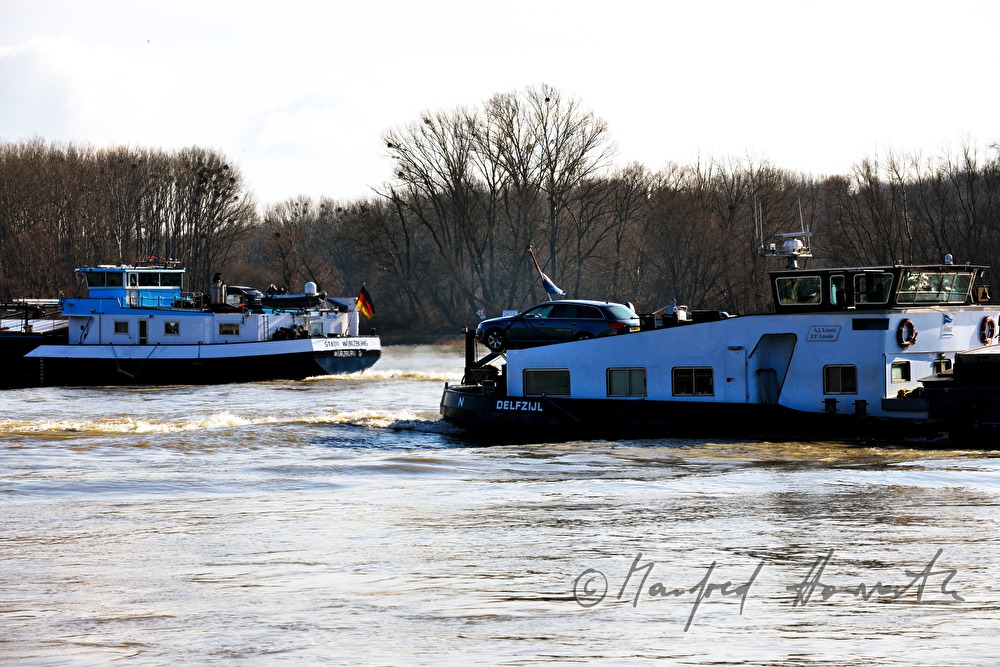 cargo ship goes upstream on the river Danube