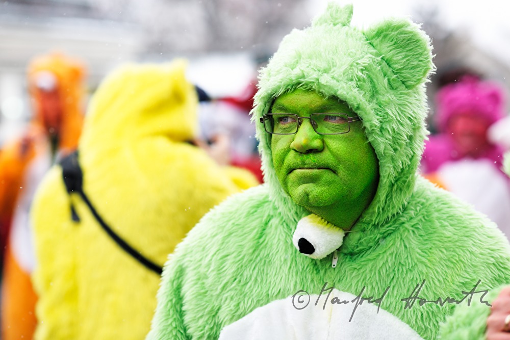 man disguised as bear during Mardi Gras