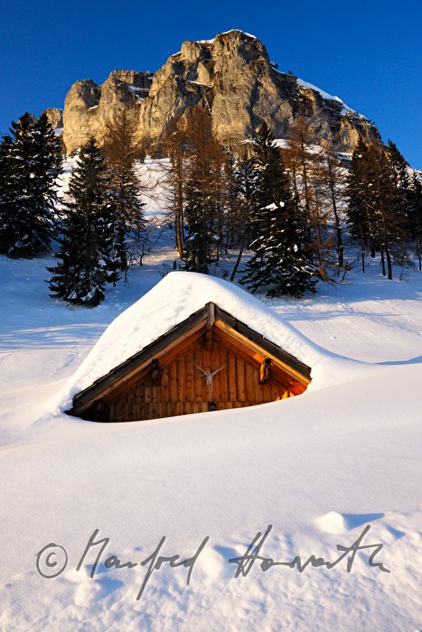peak of the Loser and snowed in alpine huts
