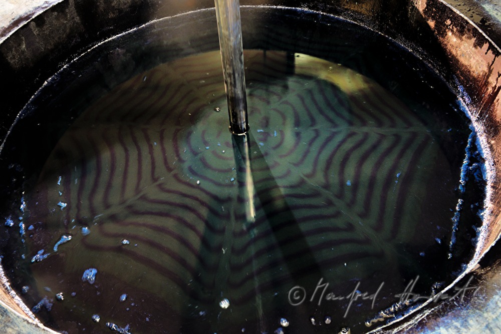 basin with indigo dye in the blueprint workshop of Wagner family