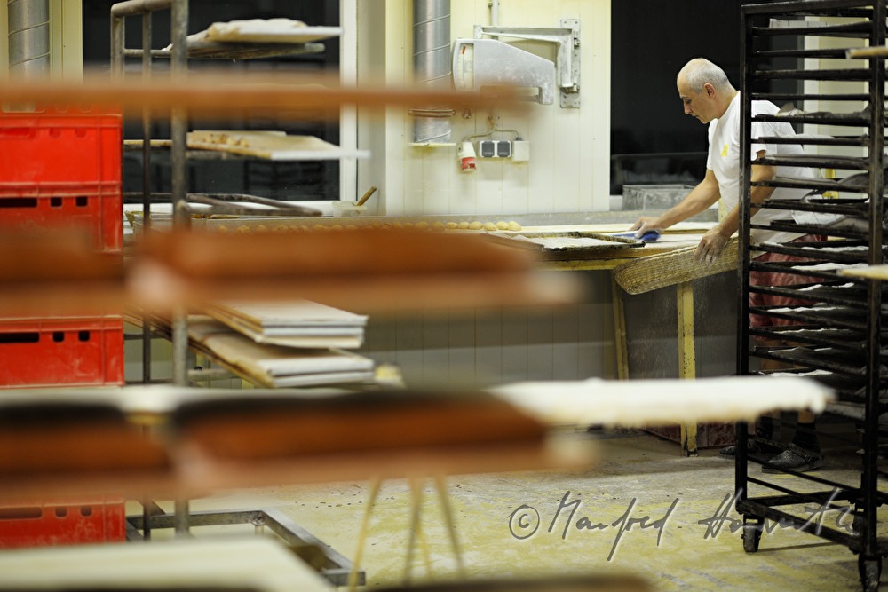 baker sweeping the workplace