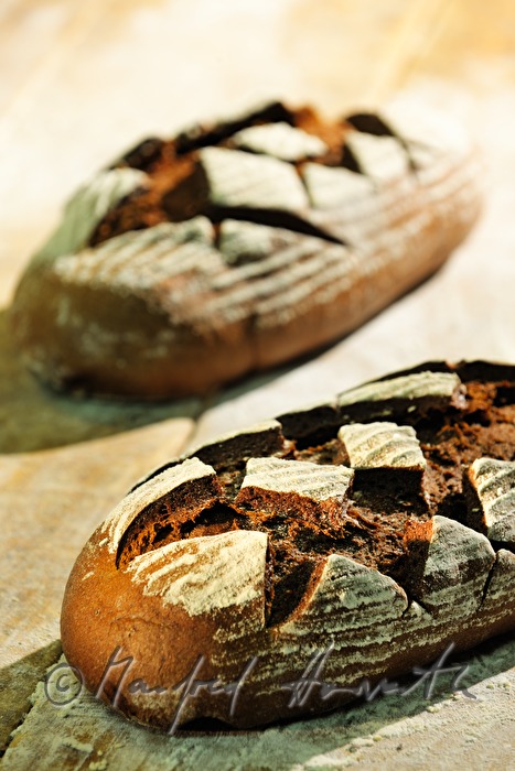 freshly baked rye bread near the baking oven