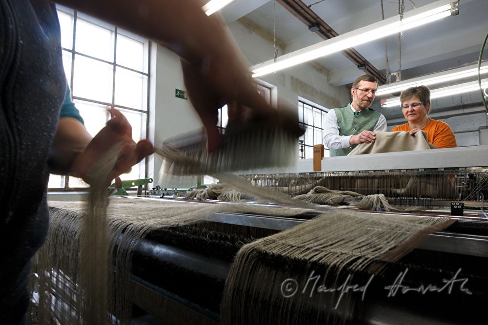 weaving of linen cloth on the mechanic loom