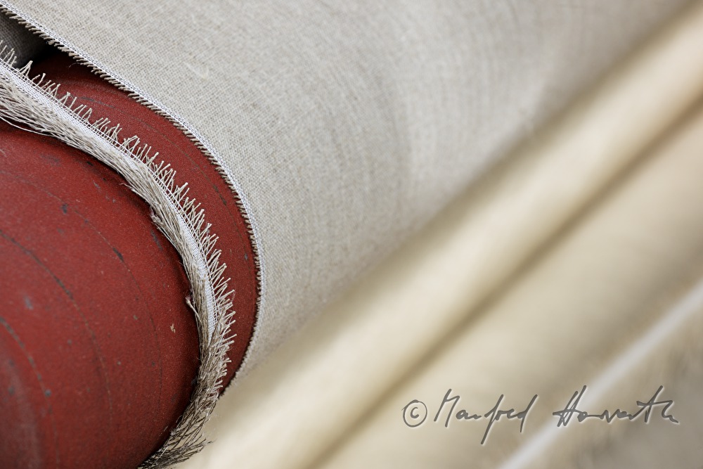 weaving of linen cloth on the mechanic loom