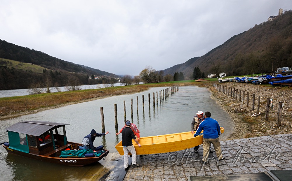 new built barges are beung carried down to the river