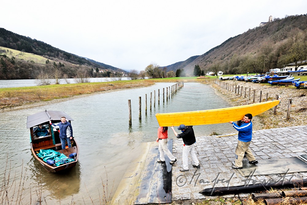 new built barges are beung carried down to the river
