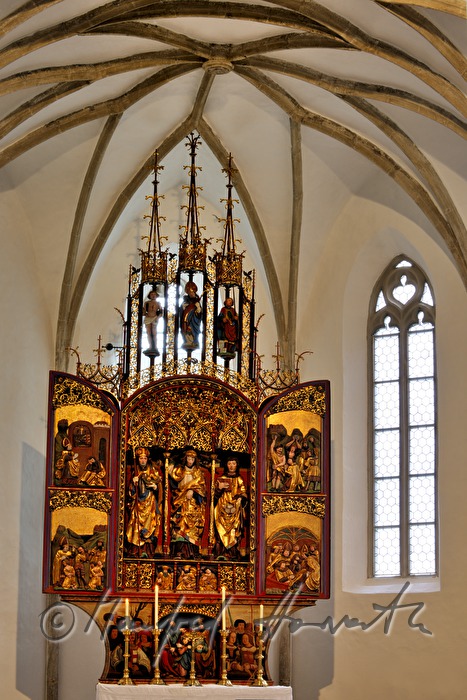 gothic winged altar and ribbed vault in the pilgrimage church