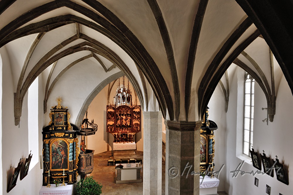 gothic winged altar and ribbed vault in the pilgrimage church