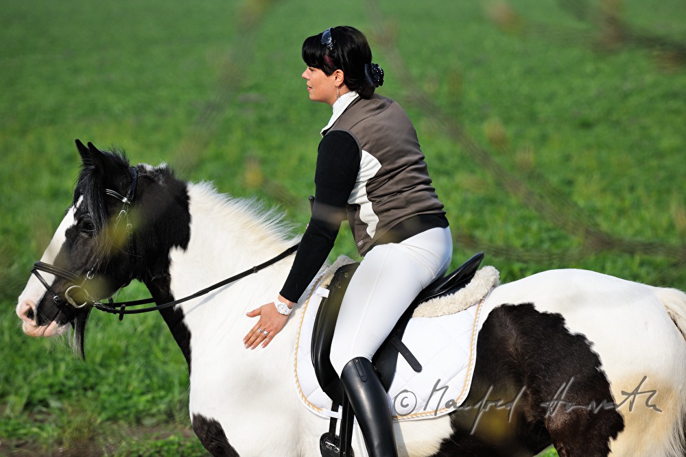 horsewoman waits for the start of the horse pilgrimage