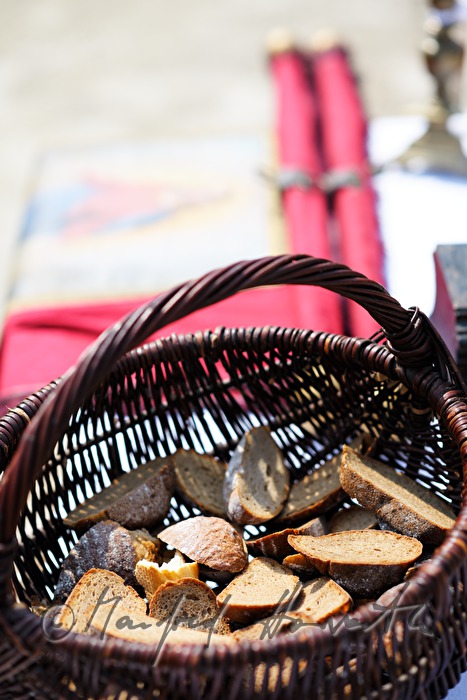 bread in a basket at the open air mass at the horse farm