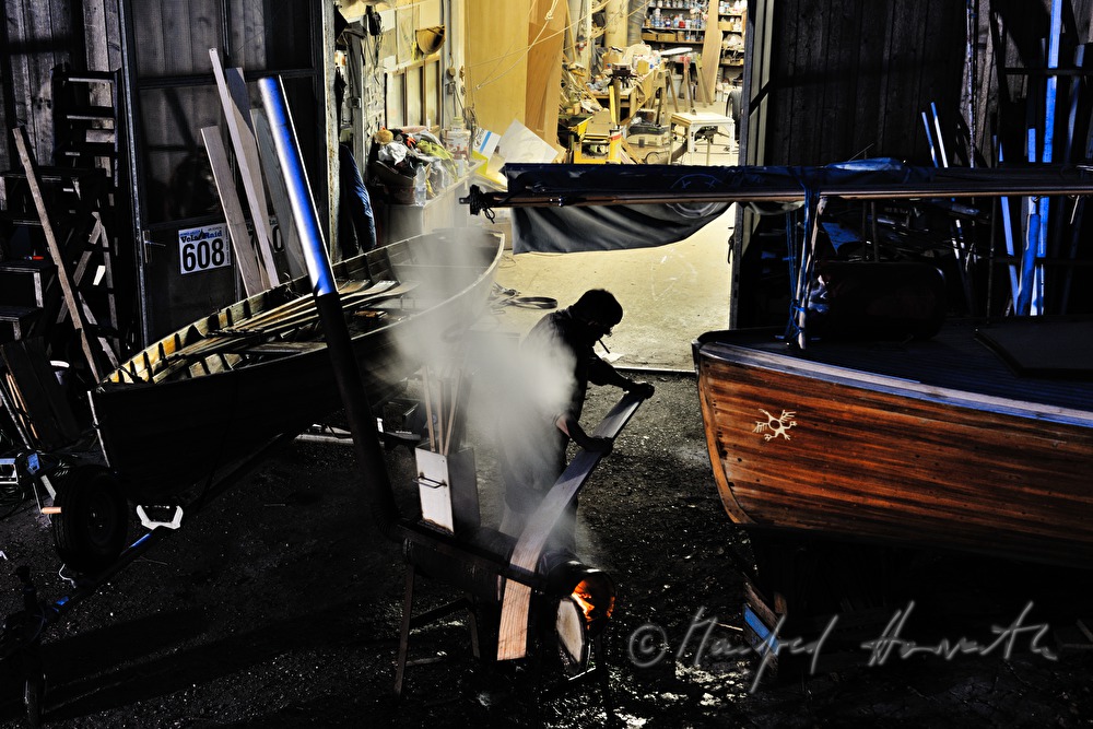 bending a plank over hot water vapour