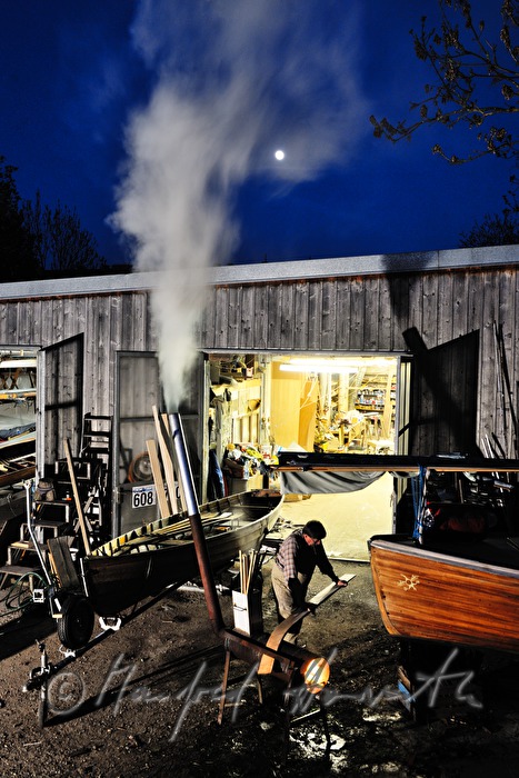 bending a plank over hot water vapour