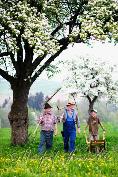 farmer family on the way to the field work