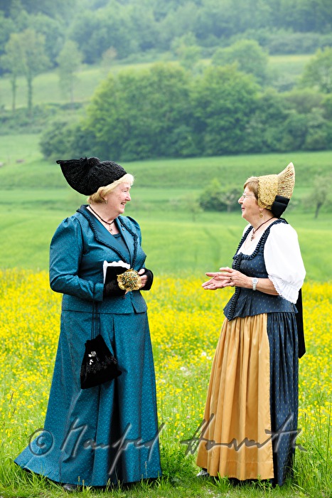 meeting of women in traditional clothes