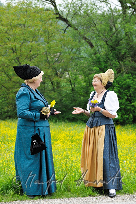 meeting of women in traditional clothes