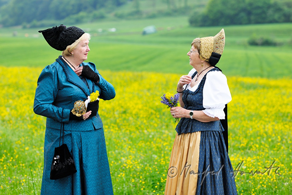 meeting of women in traditional clothes
