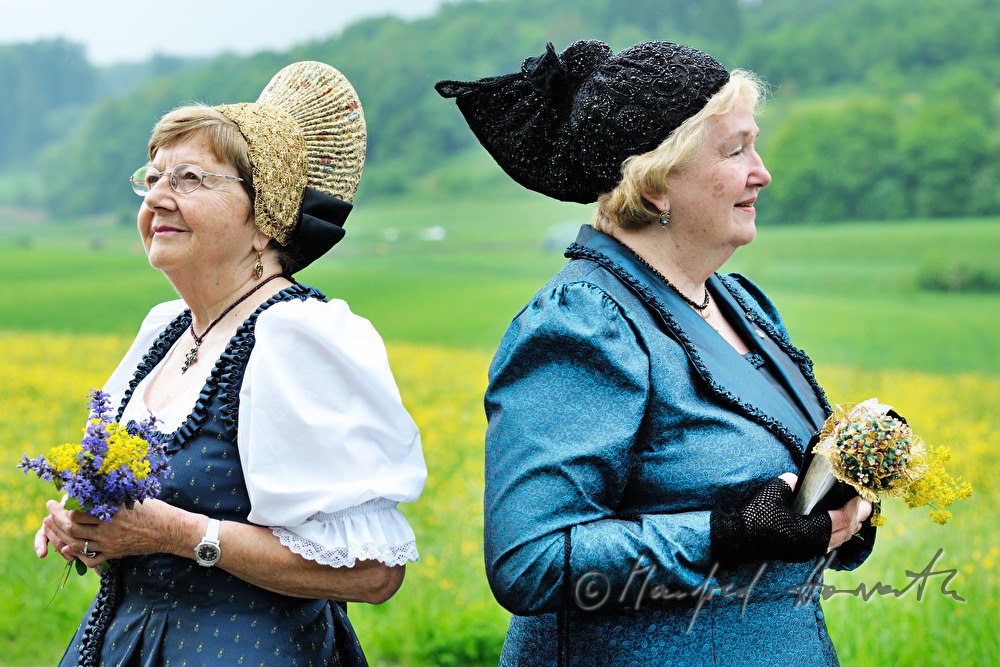 meeting of women in traditional clothes