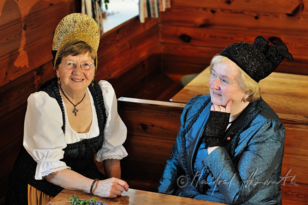 women in traditional dresses and Goldhauben
