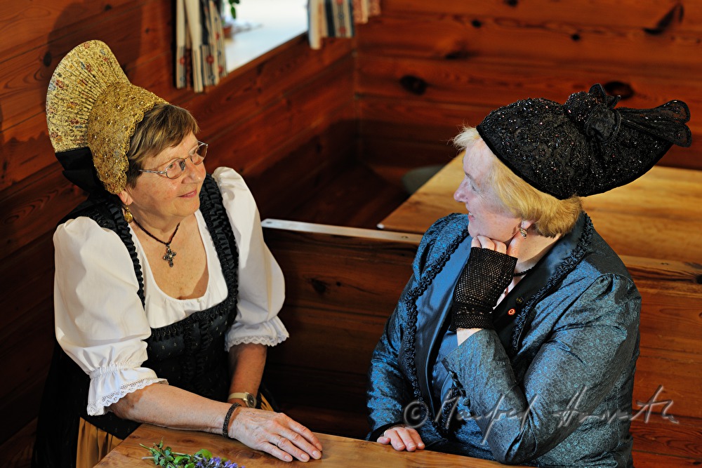 women in traditional dresses and Goldhauben