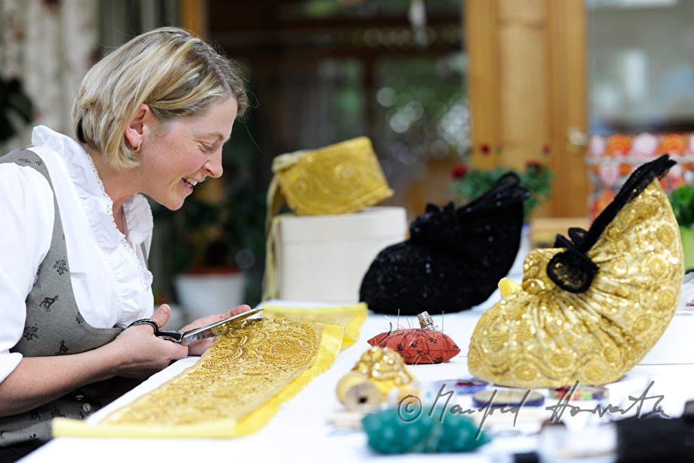woman making her own Goldhaube
