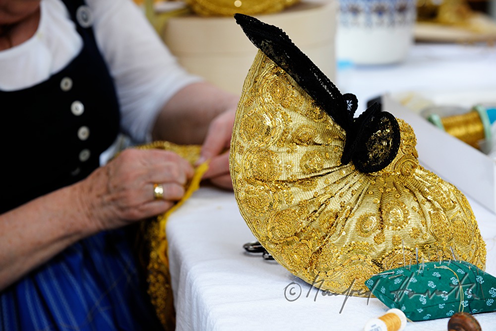 woman making her own Goldhaube