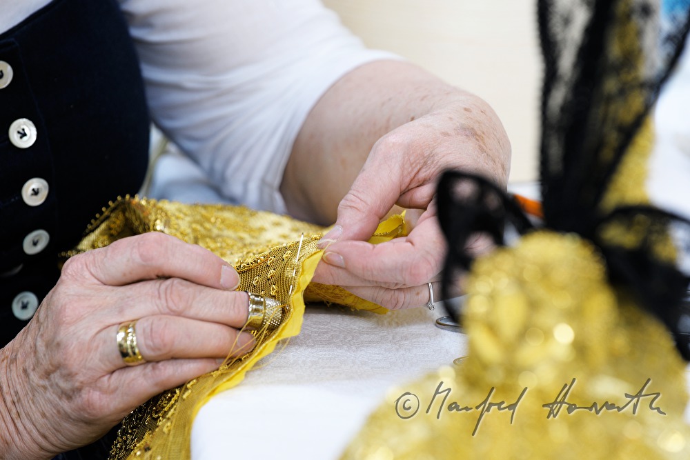woman making her own Goldhaube