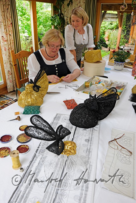 woman making her own Goldhaube