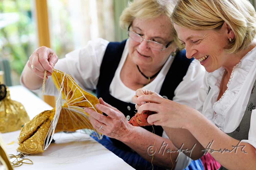 woman making her own Goldhaube