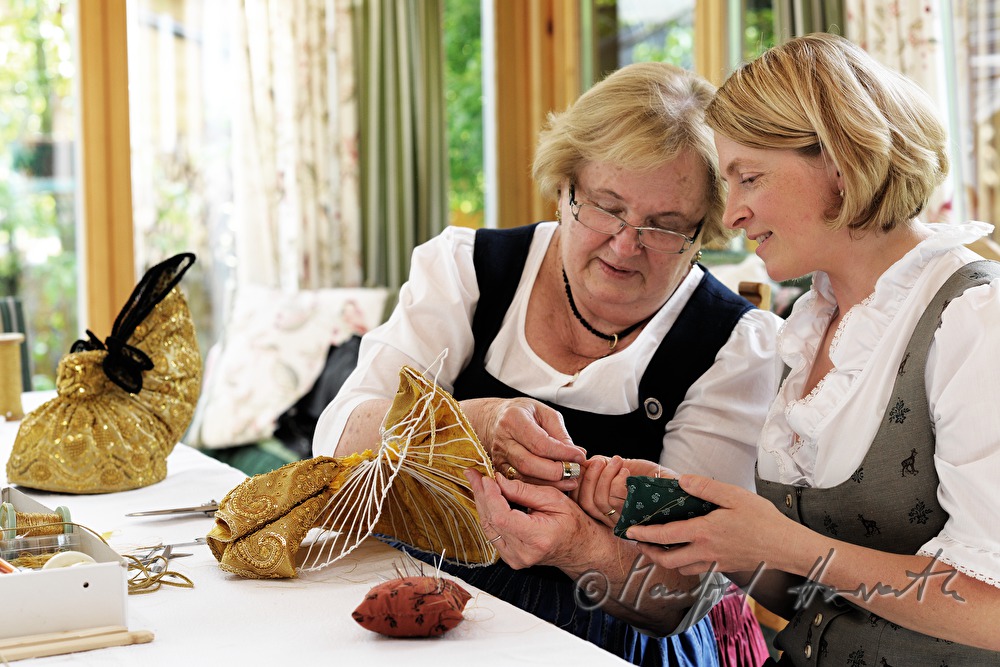 woman making her own Goldhaube