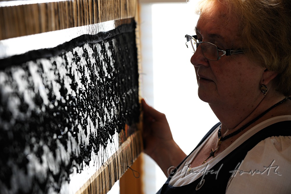 lace cloth in a frame for making a hat