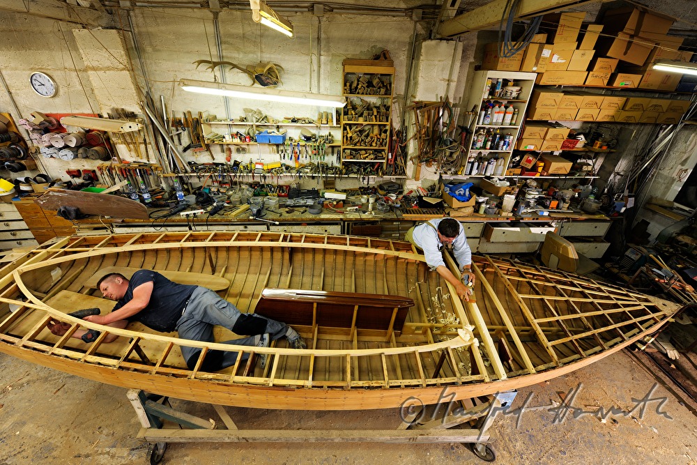 renovation of a wooden boat in the workshop
