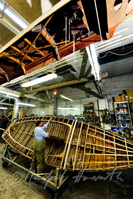 renovation of a wooden boat in the workshop