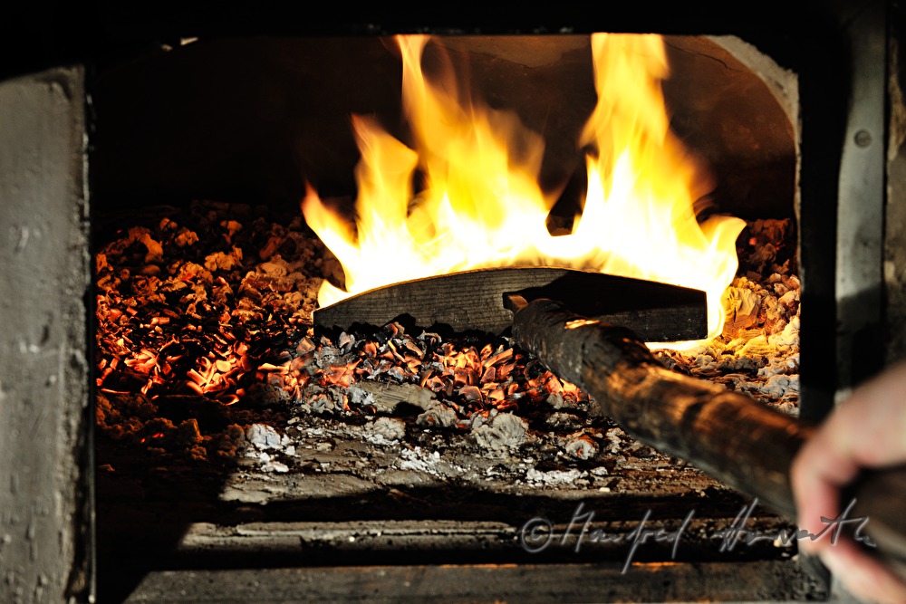 view into the wood fired oven and the glow