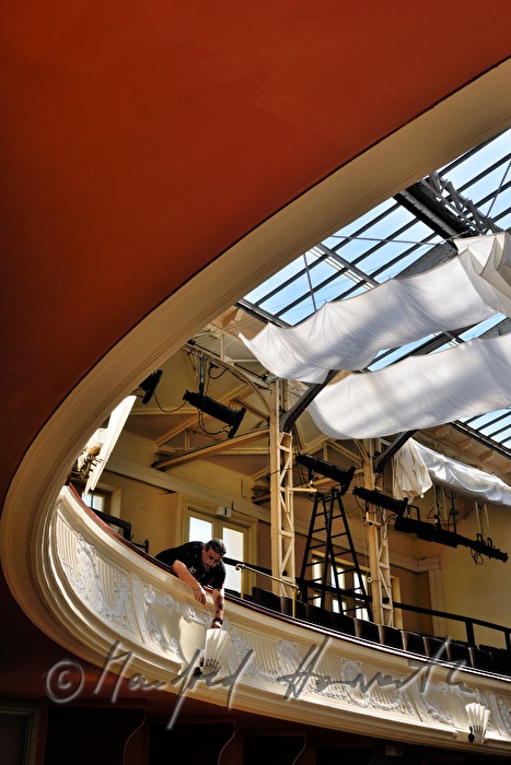 lighting technician sets the spotlights